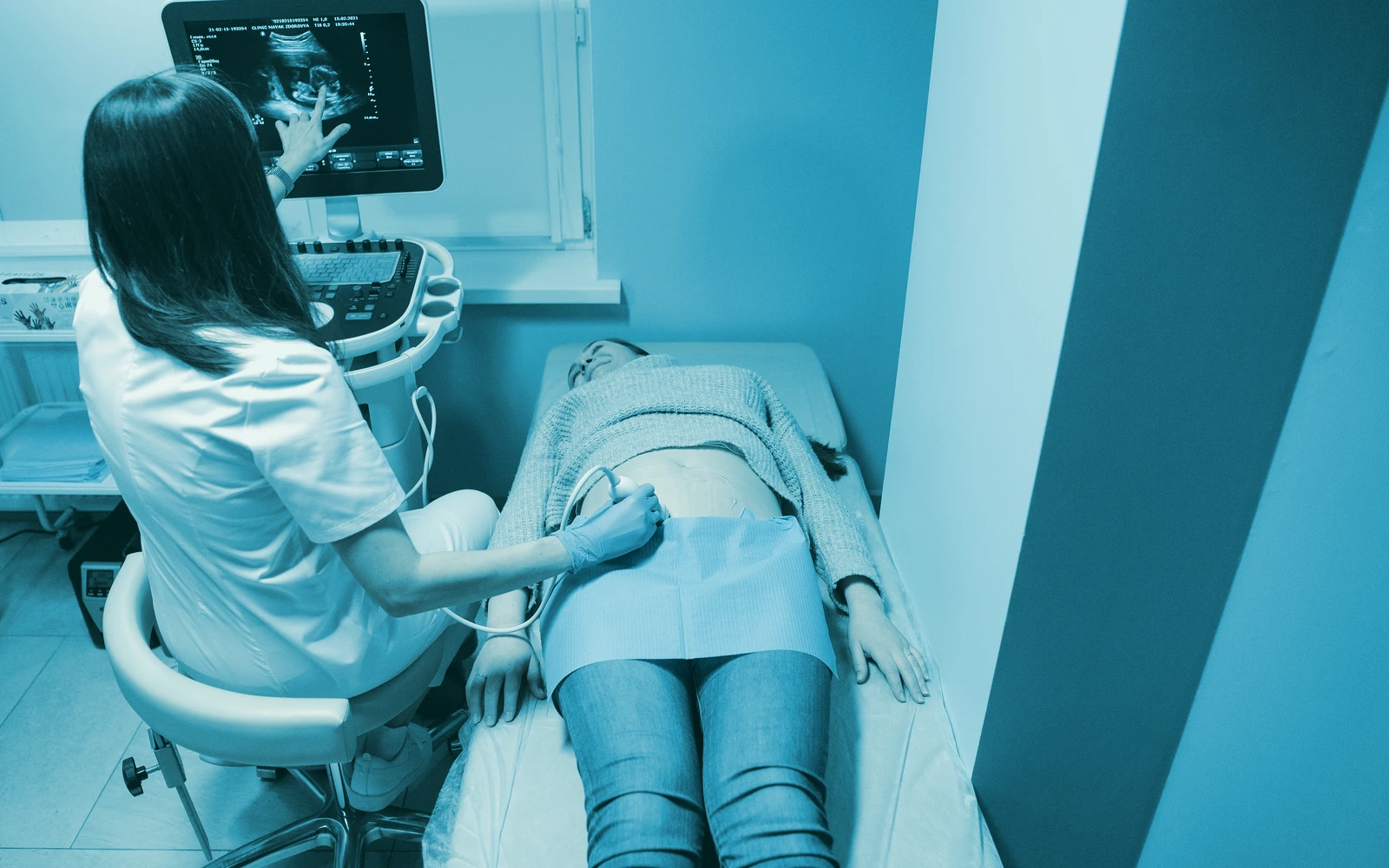 Ultrasound examination taking place in a private clinical room
