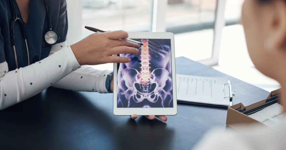 ProMed clinician reviewing mobile x-ray results with a patient
